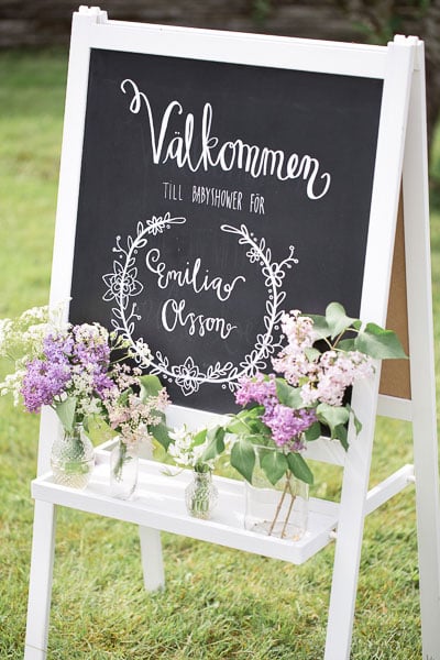 Stående skylt med blommor
