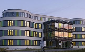 Das Bild zeigt das Firmengebäude der INFORM GmbH aus Aachen