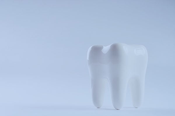 Tandläkare Malmö, en vit tand